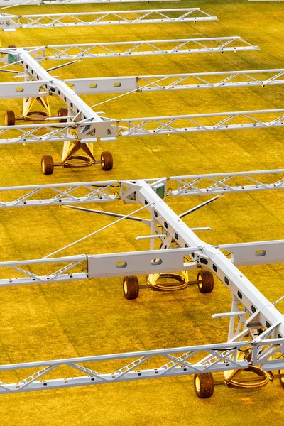 Artificial light system for growing lawns on football stadiums