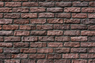 Eski kırmızı tuğla duvarın arka planı. Grunge tuğla işçiliğinin dokusu