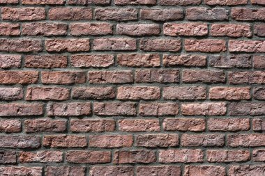Eski kırmızı tuğla duvarın arka planı. Grunge tuğla işçiliğinin dokusu