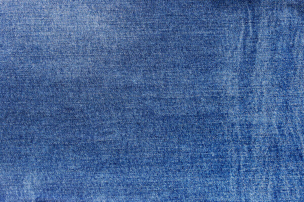texture of blue jeans denim fabric background