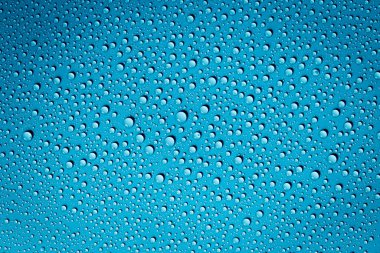 Mavi Arkaplanda Su Damlaları