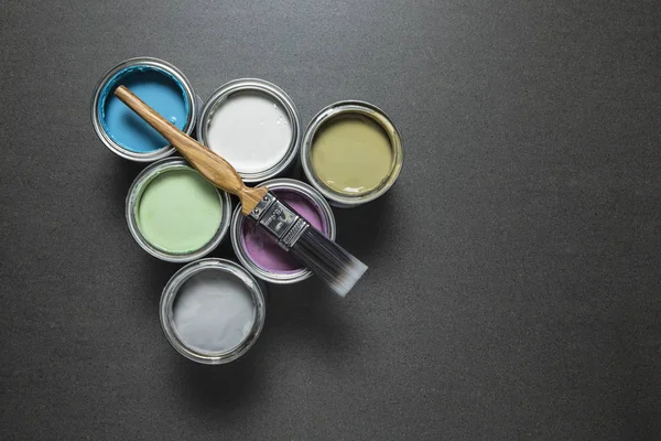 Pastel Paint Tins Brush Grey Marble Surface — Stock Photo, Image