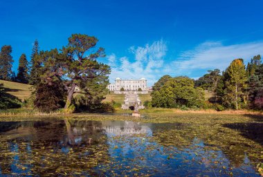 Enniskerry, Ireland, 24th of September 2018. Powerscourt House at Powerscourt Garden. Panoramic view. It's one of leading tourism attractions in Ireland. clipart