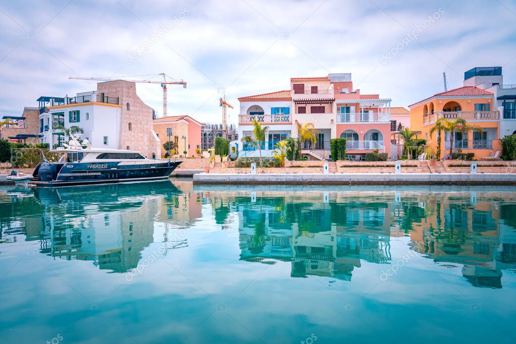 Beautiful view of Marina, Limassol city Cyprus. Modern, luxury life in newly developed port with yachts, restaurants, shops and waterfront promenade.