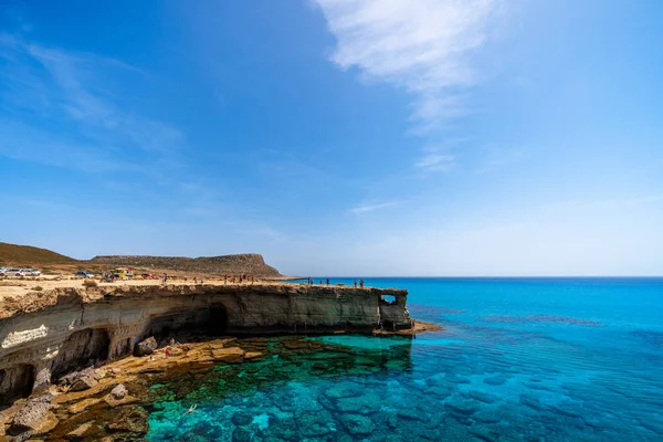 Amazing sea and rocks formation in Cyprus island. Sea Caves at Natural park Cape Greko. Beautiful blue and turquoise Mediterranean sea.