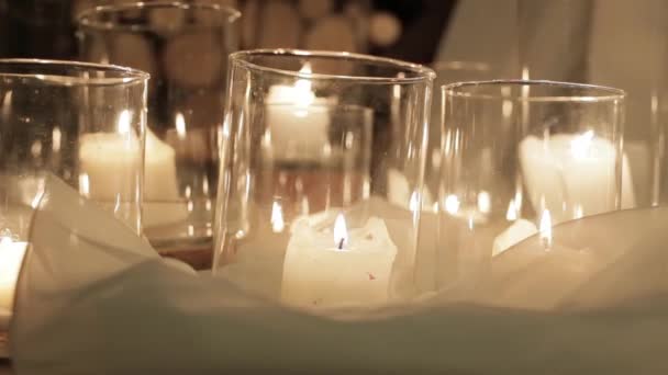 Video Decorations Installation Burning Candles Glass Flasks Floor — Stock Video