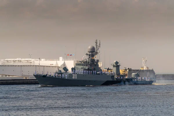 Small anti-submarine ship runs along Kronstadt during the celebration of the Day of The Navy. 28 July 2019.