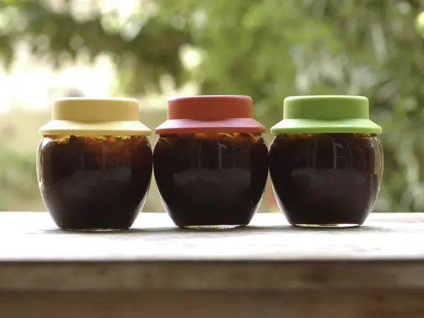 Homemade jam in jars outdoors