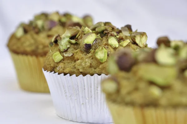 Banana Orange Muffin with crushed Pistachio nuts topping