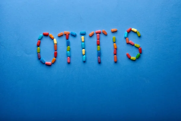 Palabra Otitis Presenta Partir Tabletas Multicolores Vitaminas Caramelos Jalea Nombre — Foto de Stock