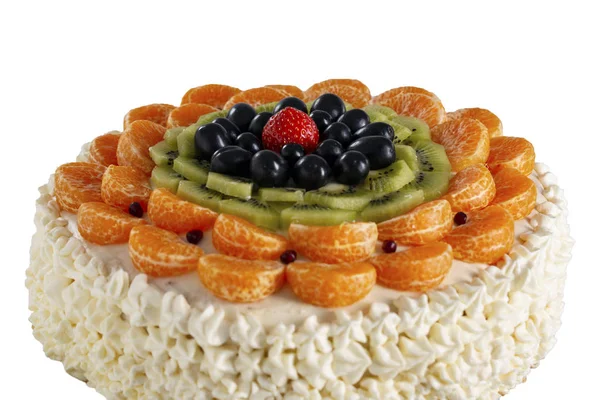 cake made from natural ingredients, fresh kiwi, grapes, tangerin