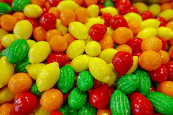 Closeup photo of colorful candies, fruits