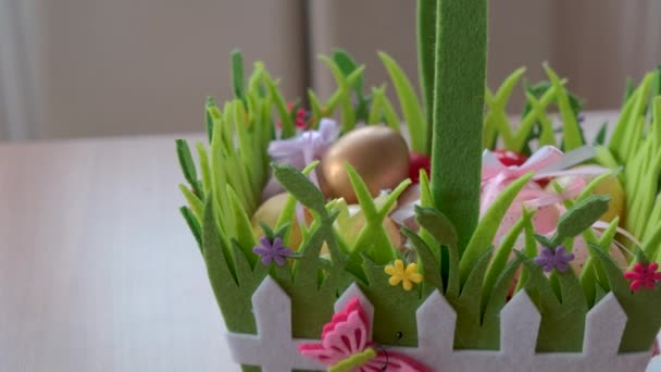 Easter eggs folded in a basket — Stock Video