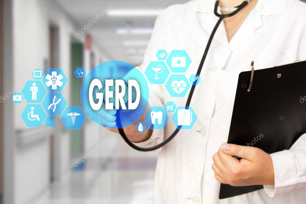 Medical Doctor with stethoscope and word GERD, Gastroesophageal 