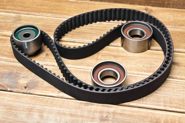 Timing belt with rollers on background .Kit of timing belt for c