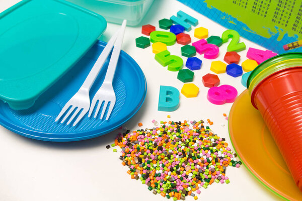 Plastic granules disposable tableware and children's toys made o