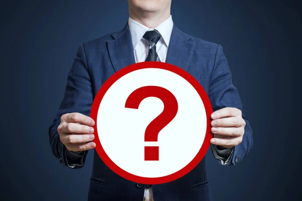 Businessman Holding Poster Question Mark — Stock Photo, Image