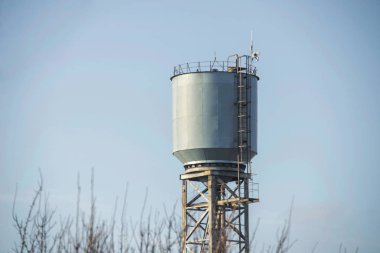 Water tower against the sky clipart