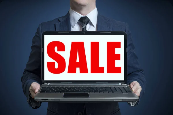 Businessman Showing Laptop Inscription Sale — Stock Photo, Image