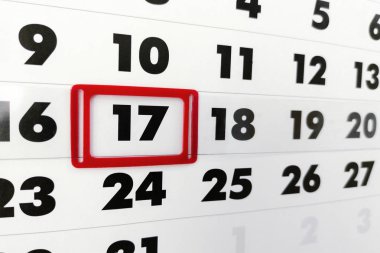 Duvar takvimi çerçeveli tarihte 17 kırmızı işareti ile levha. Kırmızı bir kutu içinde 17 numara ile beyaz kağıt takvim