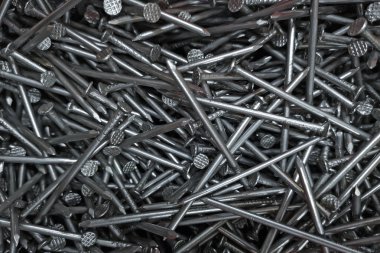 Tam çerçeve arka plan çok sayıda metal çivi gösterilen. Marangozluk parlak tırnaklar arka planı kapat