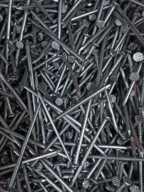 Tam çerçeve arka plan çok sayıda metal çivi gösterilen. Marangozluk parlak tırnaklar arka planı kapat