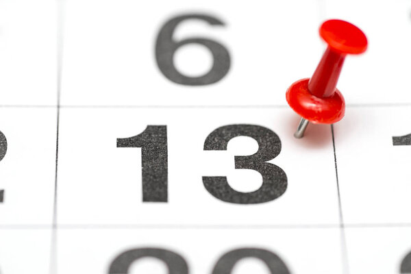 Pin on the date number 13. The Twenty second day of the month is marked with a red thumbtack. Pin on calendar
