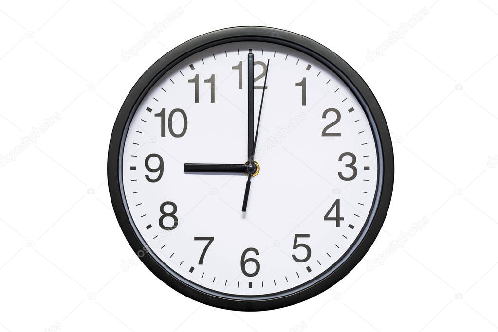 Wall clock shows time 9 o'clock on white isolated background. Round wall clock - front view. Twenty one o'clock