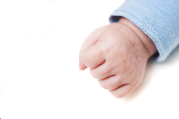 Close up of a child's fist on white background. Clenched fist - hand of child, baby power. New born baby hand — Stock Photo, Image