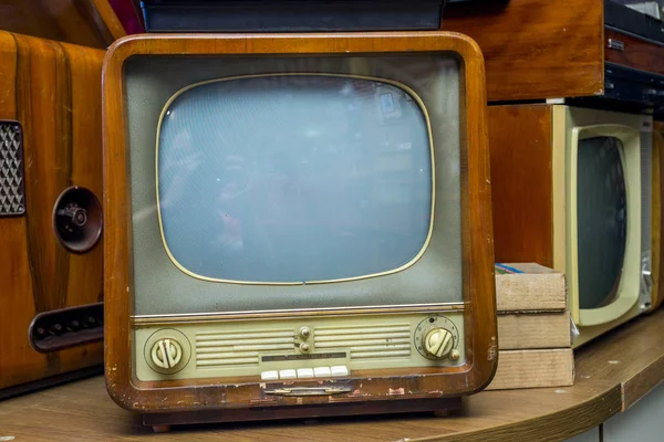 Ancient old television set show in the electrical stores. Old vintage television set