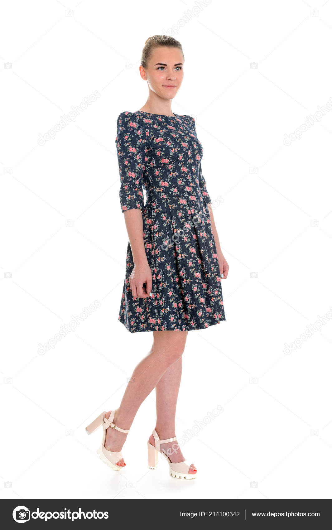 Pretty Young Girl Wearing Flower Printed Dress Stock Photo by