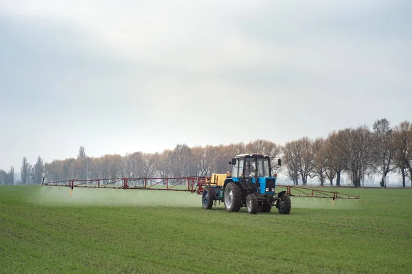 Wheat Field Tractor Spraying Agrochemical Agrichemical Young Grain Field Most — Stock Photo, Image