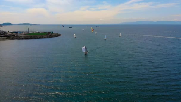 Aerial shot of a sailing yachts boats on a race — Stock Video