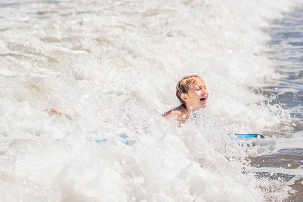 Happy Boy Swimming Surfboard Waves Ocean — Stock Photo, Image