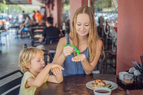 Mother Son Using Wash Hand Sanitizer Gel Cafe Eating — Stock Photo, Image