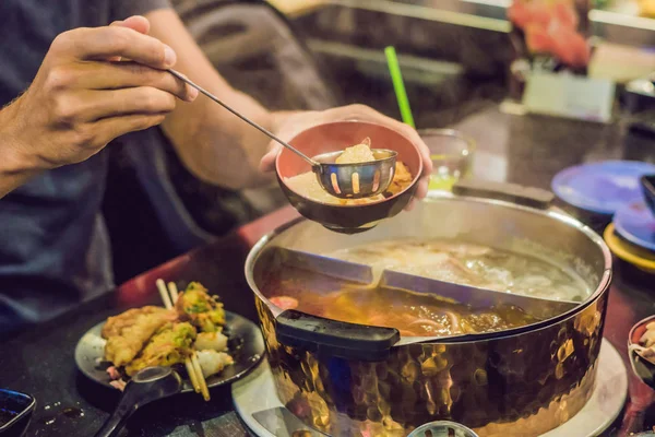 Man Puts Soup Plate — Stock Photo, Image