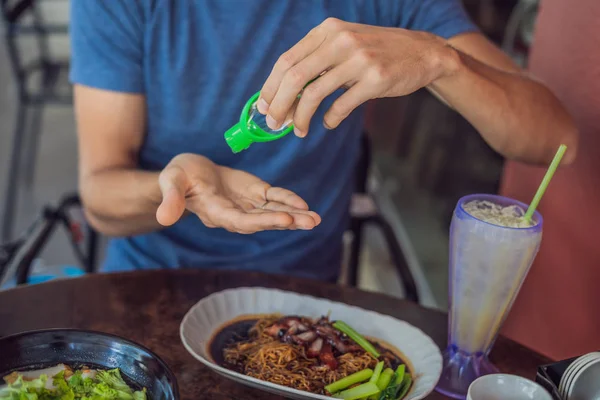 Mens hands using wash hand sanitizer gel pump dispenser — Stock Photo, Image