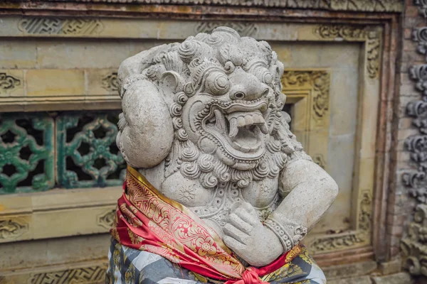 Balinese Demon statue dressed in a sarong