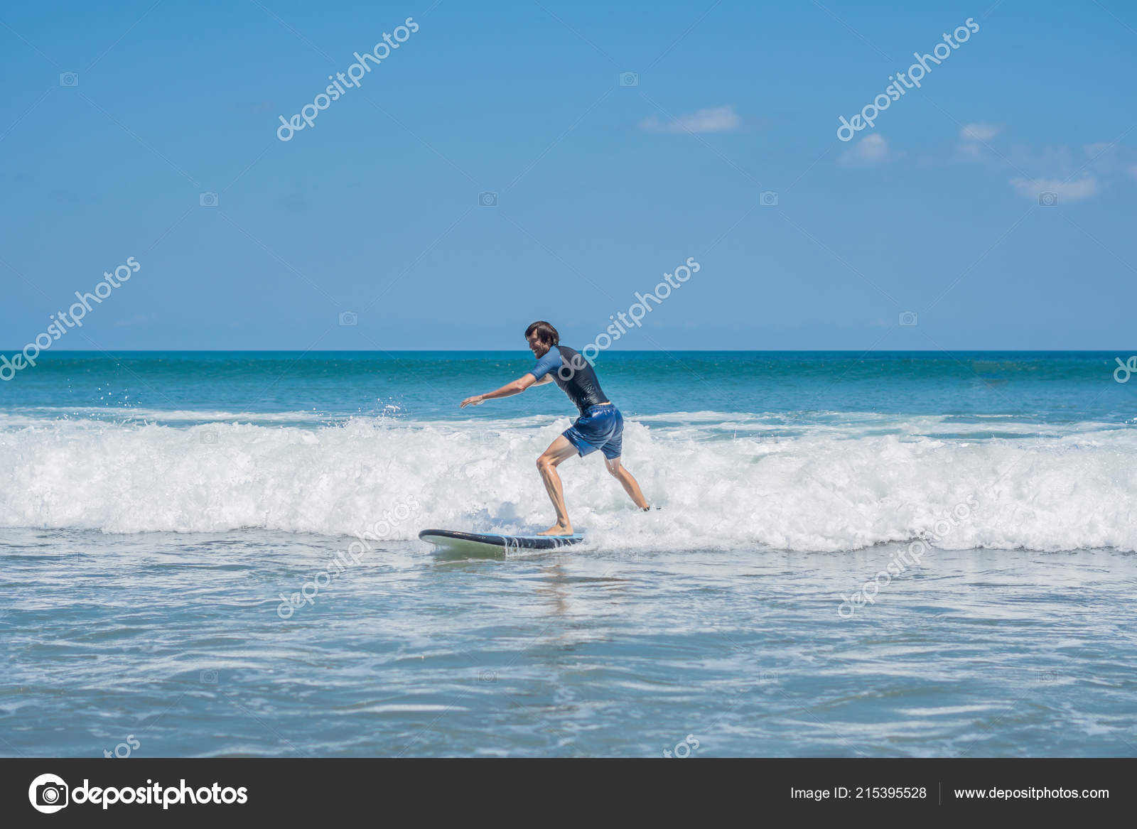 Young Man Learning Surf Ocean Waves Bali Island Indonesia Young Man Learning Surf Ocean Waves Bali Island Indonesia