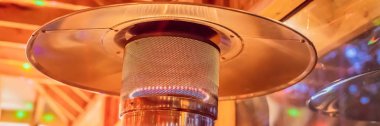Tasarım Paslanmaz çelik metal gaz yakan bulanık enteriour arka plan afiş, uzun biçim ile kapalı veranda ısıtıcı
