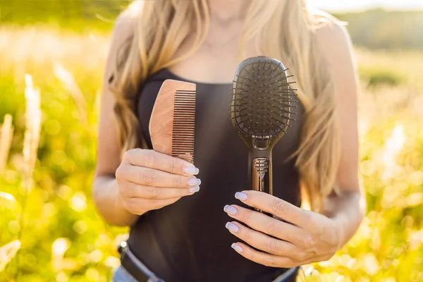 Zero waste concept. Use a wooden comb or plastic comb. Zero waste, green and conscious lifestyle concept.