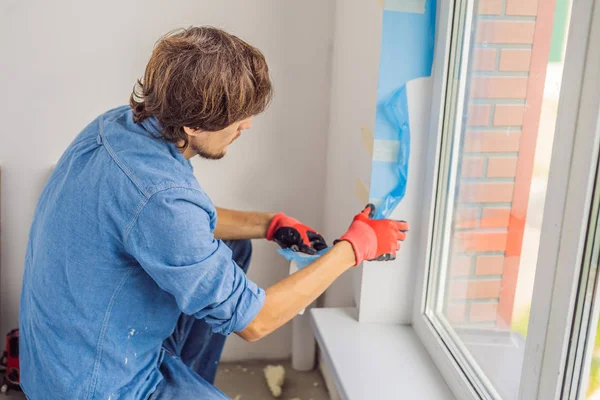 Man Blue Shirt Using Sticky Tape While Window Installation — Stock Photo, Image