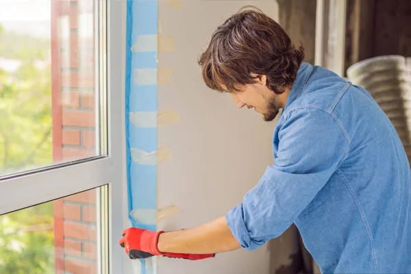 Man Blue Shirt Using Sticky Tape While Window Installation — Stock Photo, Image