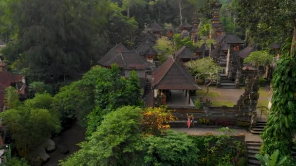 Aerial shot of the Pura Gunung Lebah temple in Ubud on the Bali island — Stock Video