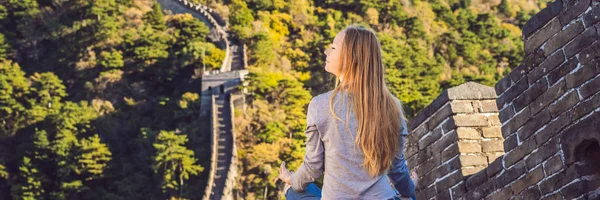 Happy cheerful joyful tourist woman at Great Wall of China meditates on vacation trip in Asia. Girl visiting and sightseeing Chinese destination BANNER, LONG FORMAT — Stock Photo, Image