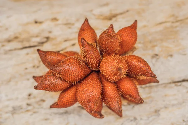 Red Fruit Salacca, Red Fresh Salacca on wooden table