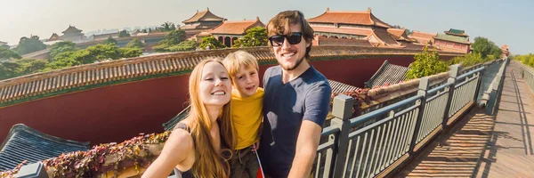 Enjoying vacation in China. Happy family with national chinese flag in Forbidden City. Travel to China with kids concept. Visa free transit 72 hours, 144 hours in China BANNER, LONG FORMAT