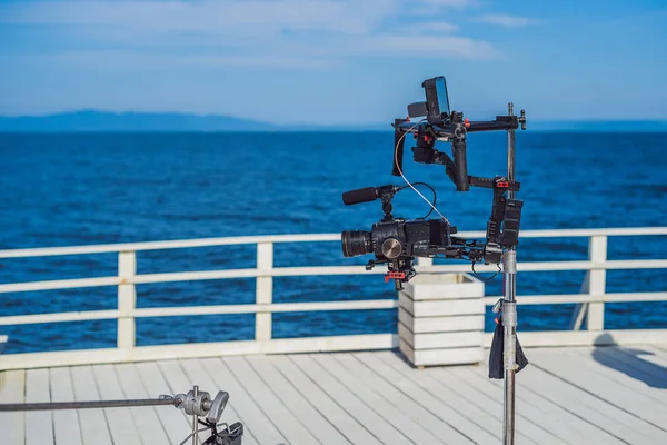 profeccional cinema camera on a 3-axis camera stabilizer system on a commercial production set