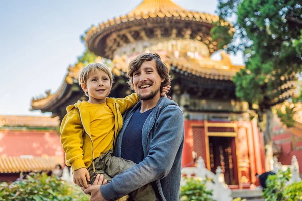 Enjoying vacation in China. Dad and son in Forbidden City. Travel to China with kids concept. Visa free transit 72 hours, 144 hours in China