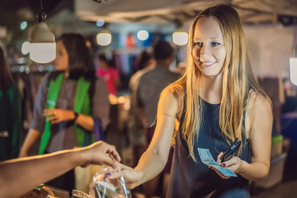 Young woman tourist on Walking street Asian food market — Stock Photo, Image